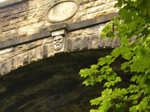 Laughing face on east key stone (c) James Perry